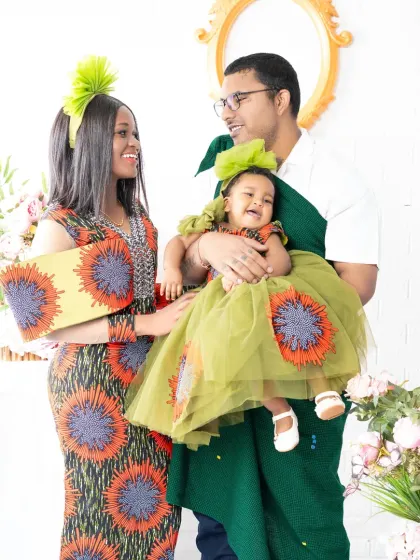 This family's coordinated outfits bring a wonderful sense of unity and style to their portrait. I love it when families use photoshoots to express their unique personality.