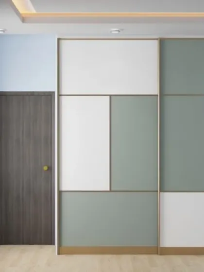 We used color blocking with sage green and white panels framed in gold to create this contemporary wardrobe. The clean, geometric design is simple yet impactful.