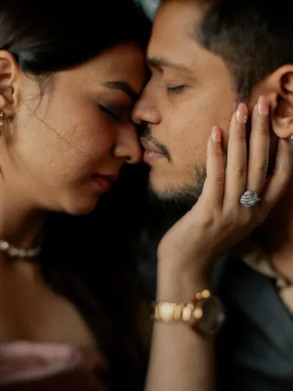 An intense and intimate close-up from the vintage car shoot, focusing on the deep connection and emotion between the couple.