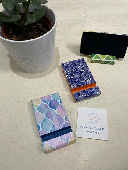 Another view of the wave and watercolor tile pattern phone stands.