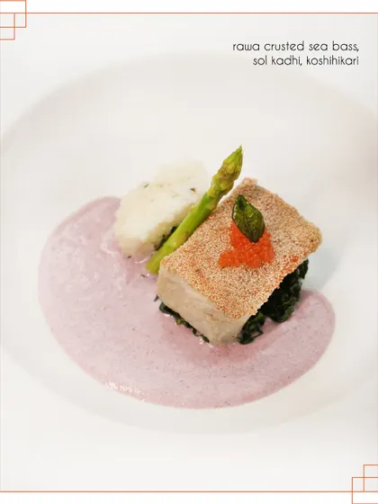 Our rawa-crusted sea bass is served with a delicate sol kadhi sauce and a side of Koshihikari rice. The semolina crust provides a perfect crunch against the flaky fish.