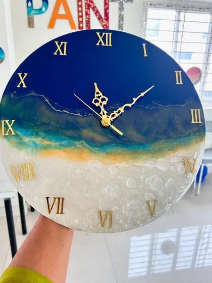 A duplicate image of the golden-hour beach themed clock.