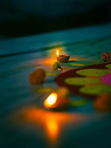 A collection of images capturing the different facets of Diwali, from the glow of sky lanterns and diyas to the beautiful bokeh of decorative lights.