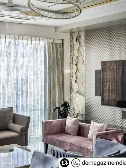 In this 4BHK luxury apartment in Lower Parel, we balanced a royal aesthetic with modern comfort. The living room features a mix of textures, from a quilted feature wall to Patagonia marble and bespoke furniture, all while maximizing the stunning views of the Mumbai skyline.