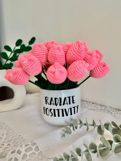 From the side, you can see the lovely shape of the crochet tulip buds. I take great care to make each flower look as realistic as possible.