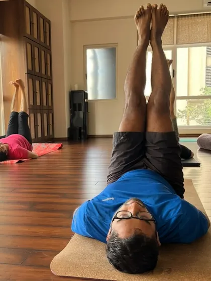 In this moment of ease, let the world melt away. Legs up the wall is a perfect way to find calm.