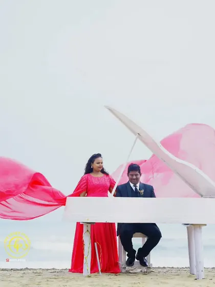 Creating unique concepts for pre-wedding shoots is part of the service. Here, the couple I styled poses with a piano on the beach, with her pink gown adding a pop of colour.