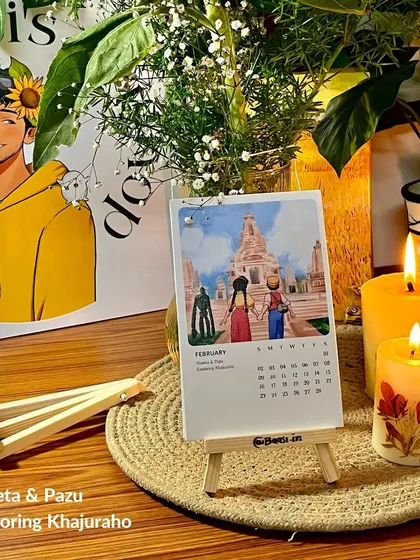 The February page, 'Sheeta & Pazu Exploring Khajuraho', set up on the easel. It shows how each month offers a new adventure.
