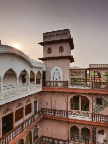 Another view of the restored Haveli Dharampura, showcasing its multi-tiered structure and ornate balconies. Its recognition as a top travel discovery underscores the success of this heritage conservation project.