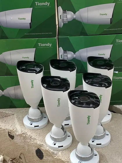A set of Tiandy bullet cameras unboxed and ready for mounting. These are excellent for outdoor use with their weatherproof design.