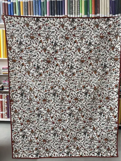 The floral backing fabric for the Dresden quilt.