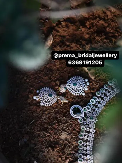 A close-up of the AD earrings.