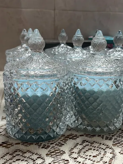 Our crystal candle is a stunning centerpiece. This one is in a lovely powder blue, made with 200gm of soy wax for a 50-hour burn time.