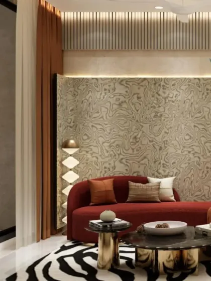 We believe in making bold statements. The combination of a vibrant red sofa, a striking zebra-print rug, and unique wall textures gives this living room a dynamic and personality-filled atmosphere.