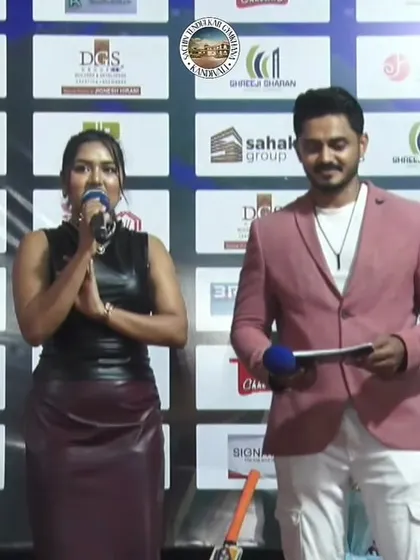 A moment of gratitude on stage with my co-host. Teamwork is key to a successful event.