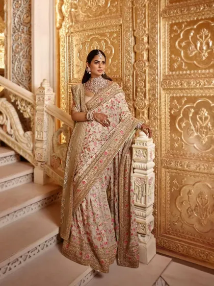 We called this the 'Garden of Love' look for Isha Ambani Piramal. The exquisite floral embroidery on this Manish Malhotra saree was an ode to her brother's wedding celebration. This is an example of deeply personal and thematic event styling.