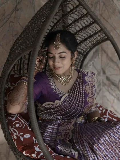 A peaceful moment. The bride's makeup is understated and elegant, allowing her to feel comfortable and beautiful.