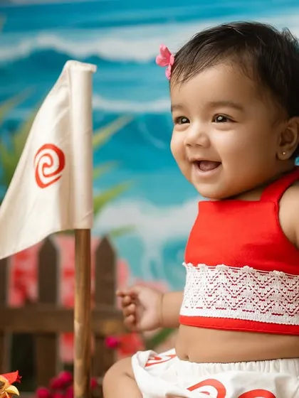 Another joyful shot of Moana, laughing as she embarks on her imaginary ocean journey.