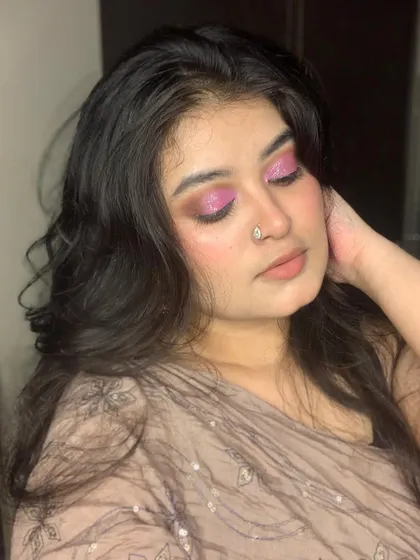 A close-up of the shimmery pink eyeshadow.