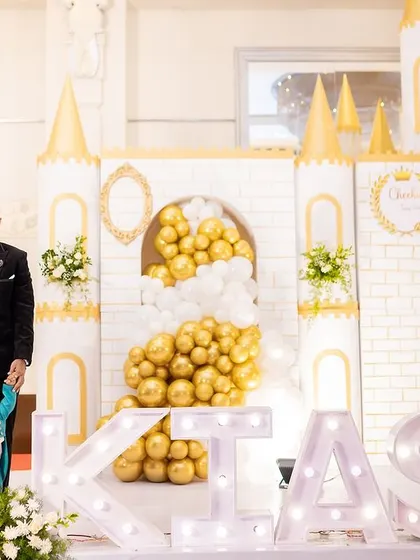 Capturing the full scale of the fairytale theme with large, illuminated marquee letters spelling out the birthday boy's name. It's a perfect photo opportunity and a grand statement piece.