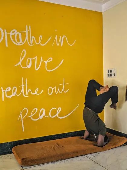 "Breathe in love, Breathe out peace." Practicing an inversion against this wall was a powerful reminder of the core message of yoga. Sometimes I forget the magic until I practice again.