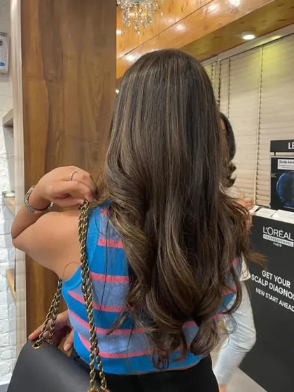 You don't always need bleach for a beautiful change. This rich balayage was achieved without any bleach, keeping the hair healthy while adding subtle, warm highlights.