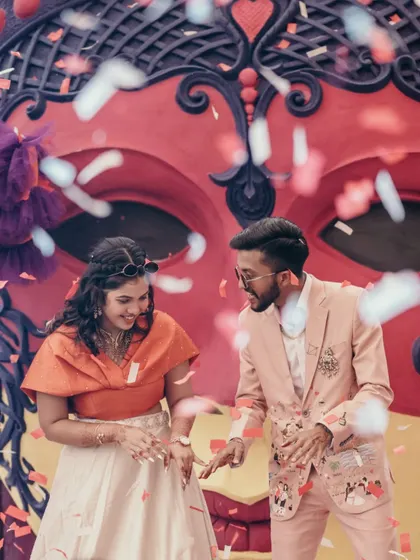 It's all about the celebration! Capturing the fun and energy of a carnival-themed party with confetti and dancing is what makes a wedding story complete.