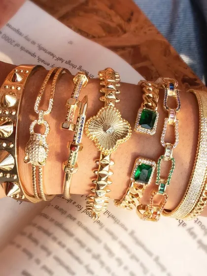 Stackaholics, I've got your fix. A gorgeous stack featuring my emerald loop, jumbo spike, and oval link cuff bangles.