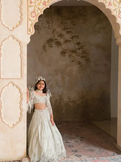 This full length view showcases the elegant fall of the lehenga skirt, designed for both beauty and comfort.