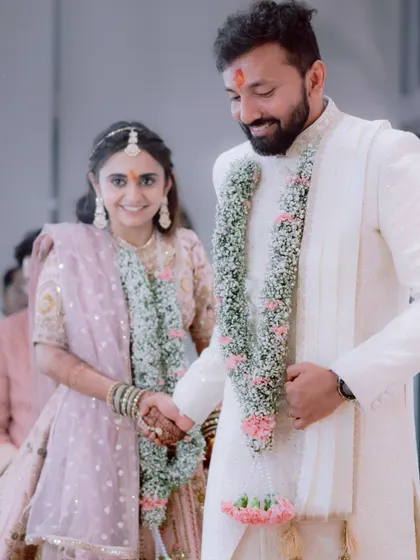 A gentle, reassuring hand-hold between the bride and groom during their ceremony. It's the small gestures of connection that we love to capture.
