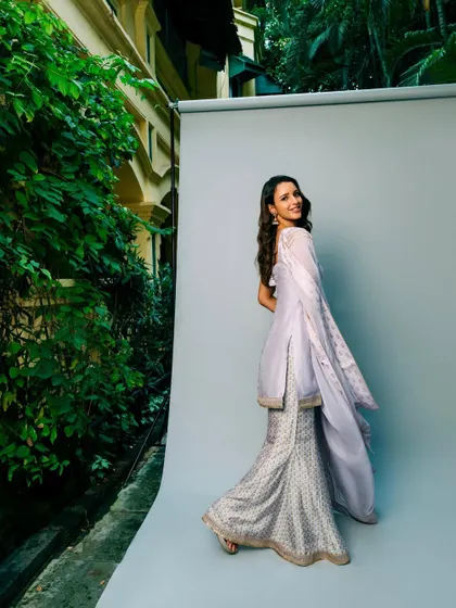 This gorgeous lilac sharara set from House of Masaba is light, breezy, and effortlessly chic. It’s a perfect rental for a daytime mehendi or a summer wedding event.
