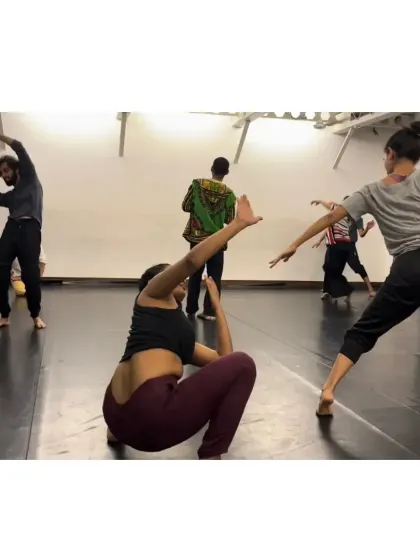 Participants exploring space and connection during a contemporary movement session. Our workshops are a safe space for individual expression and discovery.