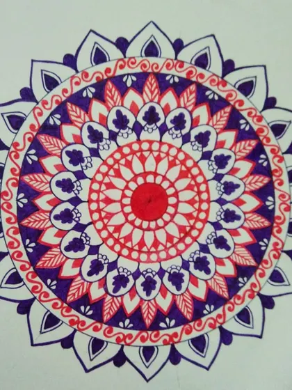 This red and violet mandala is an expression of how art is my escape. The colors reflect the strong emotions I feel when I paint, whether I'm happy or sad.