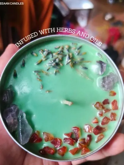 Elevate your vibe with this handcrafted green soy candle. It's infused with healing herbs, essential oils, and natural crystals to bring balance and intention into your space.