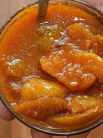 A spoonful of my tangy lemon pickle. It is soft, juicy, and has a wonderful khatta taste that goes perfectly with mathri or a simple meal of dal and rice.
