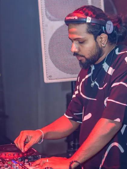 These shots capture me in my element, from different angles and at various events. Each one is a glimpse into my life as a music maker, focused on the craft and connecting with the crowd.