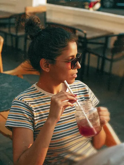 A more posed but still natural shot from the cafe series, with a classic "golden hour" feel.
