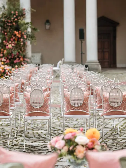 Different angles of the stunning floral mandap and ceremony setup at Hampton Court Palace, showing the scale and detail of the design.