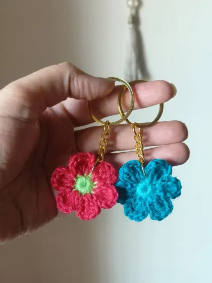 Another pair of our floral keychains, this time in pink and teal.