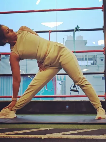 This is Revolved Triangle Pose, or Parivrtta Trikonasana. It's a deep twist that stretches the hamstrings, hips, and spine while also improving balance and digestion.