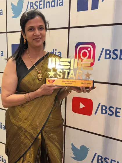 Posing with my MSME Star Award. This recognition motivates me to continue creating beautiful, handcrafted decor with all my heart.