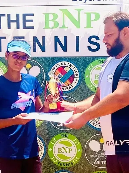 Our player Khushi Sharma receiving her winner's trophy for the CS7 U-14 girls' singles category at a BNP Tennis event.