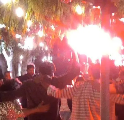 Another shot of the flare lighting up the celebration.