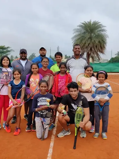 More than just an academy, we are a community. Here is a snapshot of our players and coaches after a great session on the clay courts.