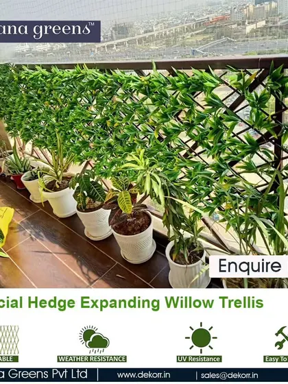 For added privacy and a touch of green on your balcony railing, I use this artificial hedge expanding willow trellis. It's weather-resistant, easy to install, and provides an instant green screen.