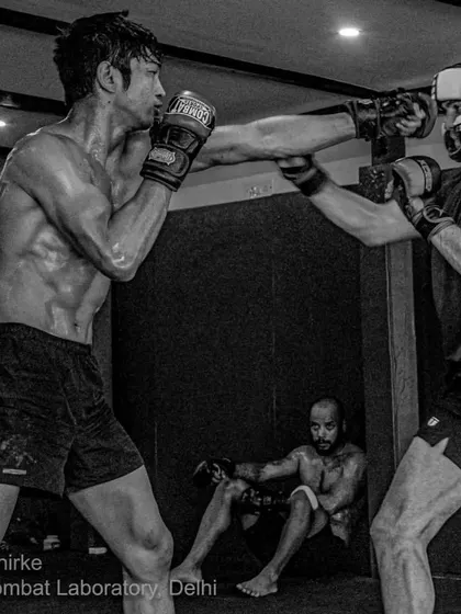 Rahul Thapa lands a clean punch during a sparring session with headgear. Training hard is essential, but training smart and safe ensures longevity.
