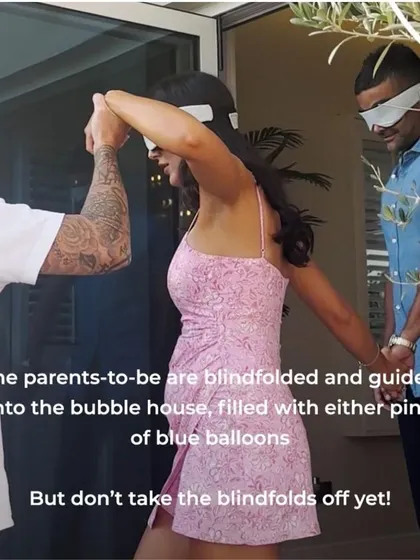 The moment of anticipation! The blindfolded parents-to-be are led towards the bubble house, which is filled with either pink or blue balloons, ready for the big reveal.