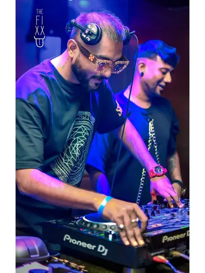 When you and your fellow DJ are perfectly in sync. A shot of me and my brother-in-arms smashing the house together.