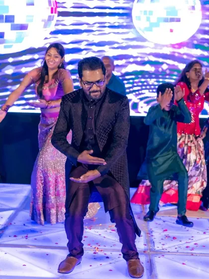 The groom shows off his moves in this fun family performance. We make sure everyone, especially the men of the family, feels comfortable and has fun learning the choreography.