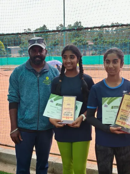 A group photo with me and the top performers in the Girls Under 14 category. Celebrating these moments together strengthens our academy's sense of family.